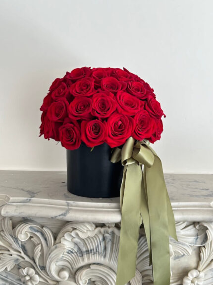 A Box of Pure Passion – classic red roses arranged in a box, perfect for love, admiration, or romantic gestures.